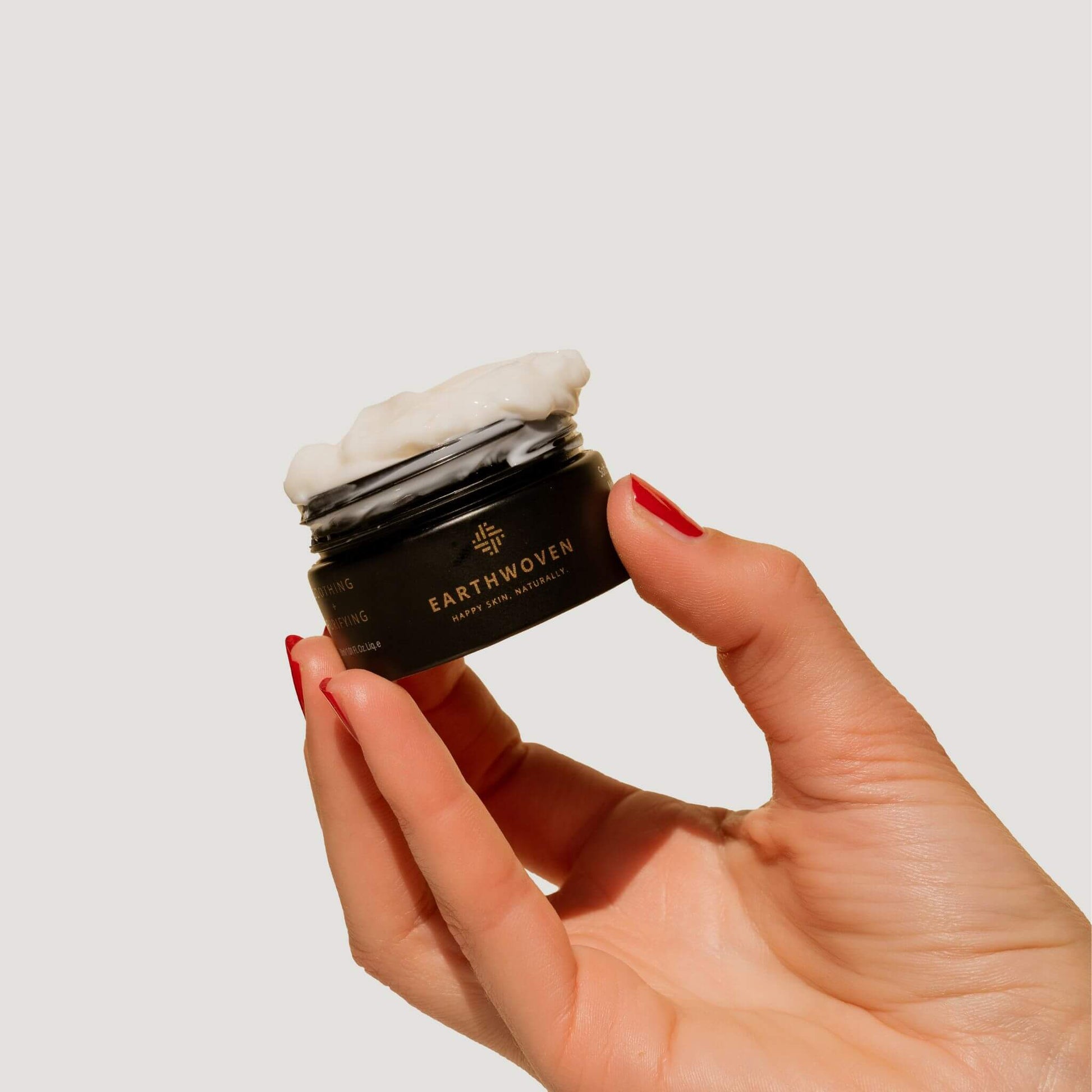 Earthwoven Moisturiser with cream texture, emphasizing its benefits for eczema, acne, and sensitive skin types.